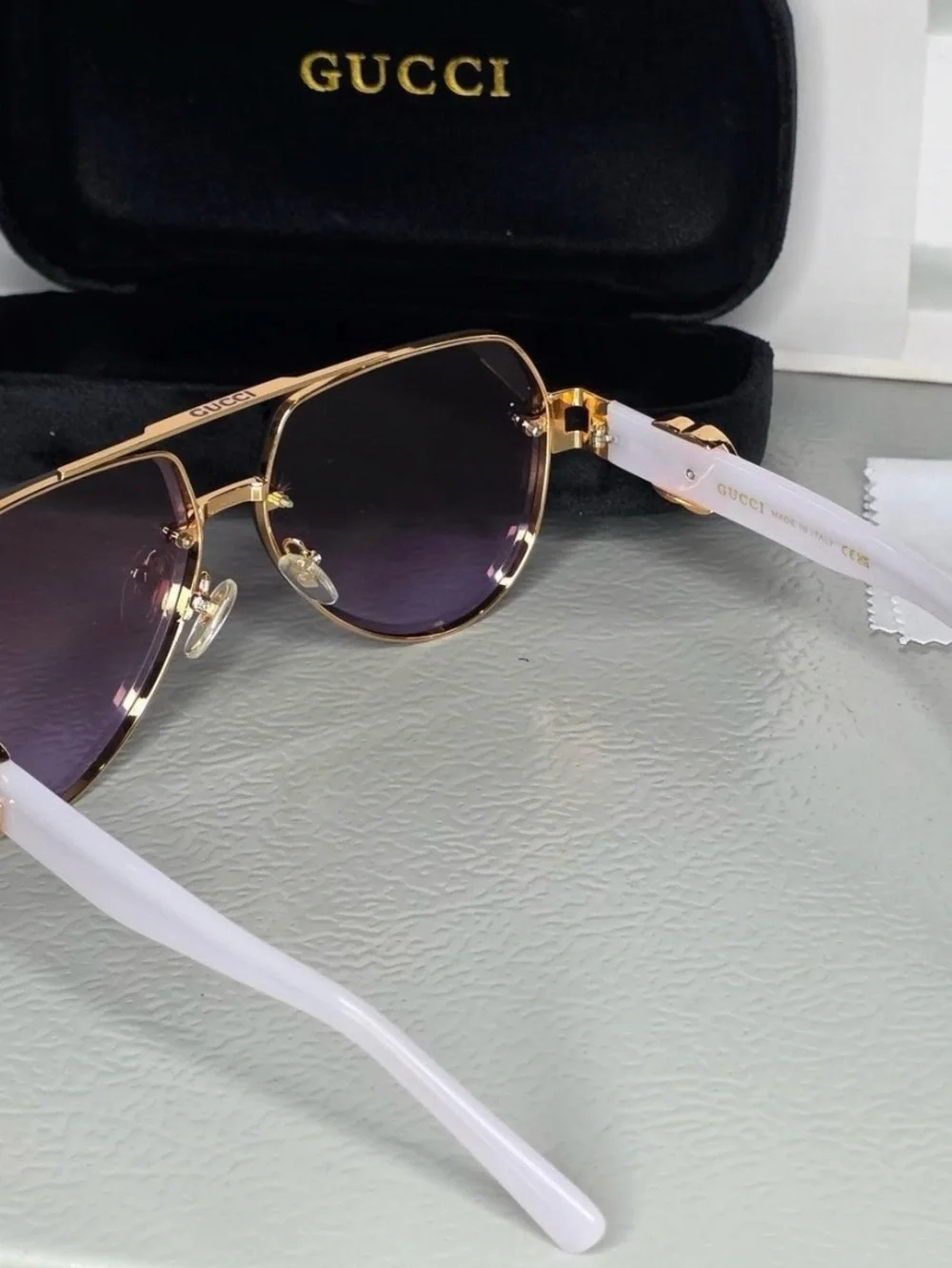 Gucci Gold Frame Sunglasses with Purple Gradient Lenses